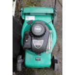 Qualcast petrol-driven lawn mower fitted with a Briggs and Stratton 450 series motor, with grass-