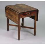A late 18th century mahogany drop-leaf table (reduced in height) fitted end drawer, & on four moulde