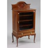 An early 20th century inlaid-mahogany small upright china display cabinet fitted three shelves