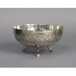 A continental silver bowl with engraved vine decoration to the exterior, the interior with