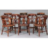 A SET OF EIGHT LATE VICTORIAN ASH & ELM SMOKER’S BOW CHAIRS, each with inverted heart motif to the