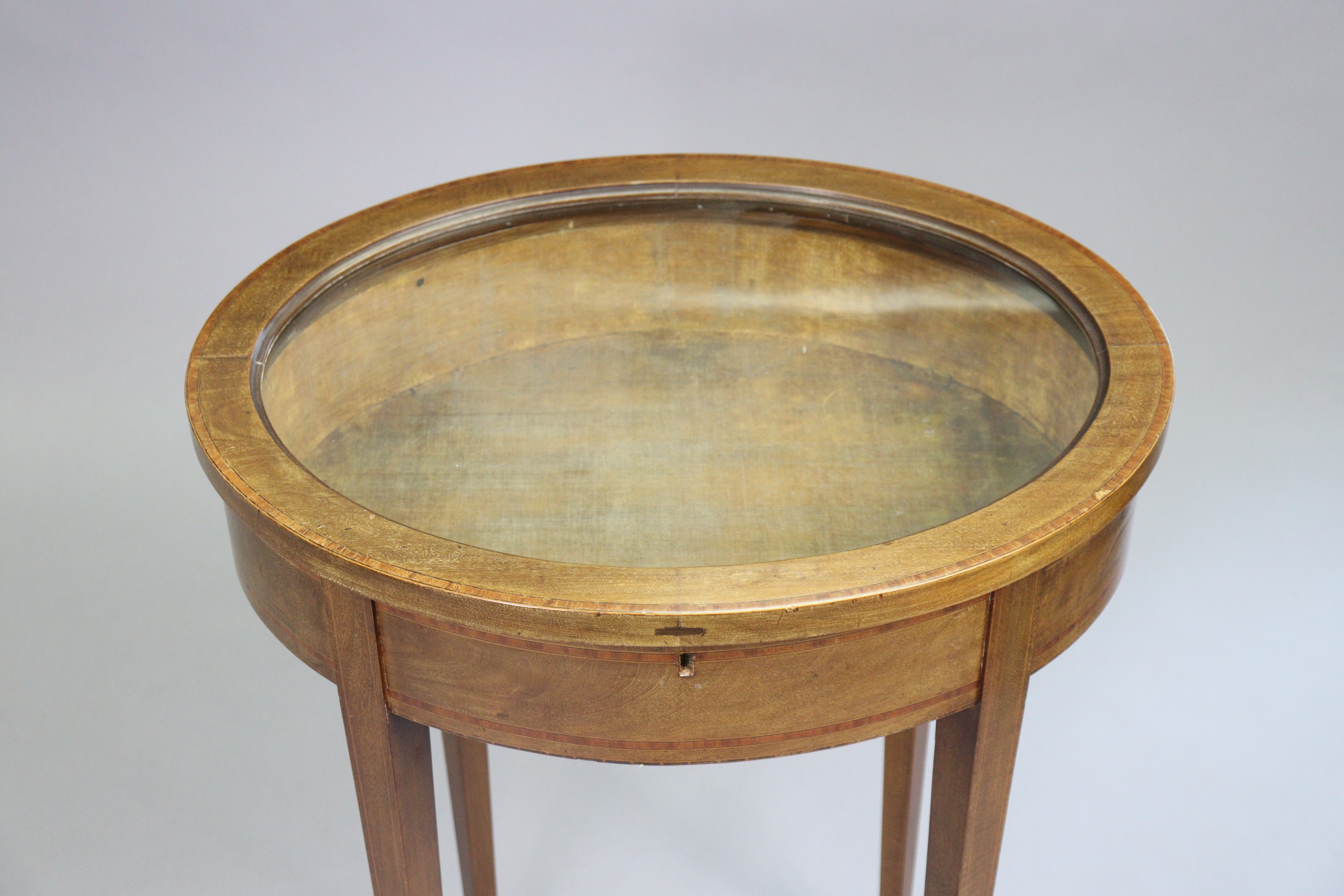 A 19th century inlaid mahogany oval bijouterie table with old-gold velour lined interior enclosed by - Image 3 of 3