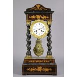 A late 19th century inlaid-mahogany portico clock, with foliate gilt brass mounts & pendulum, on