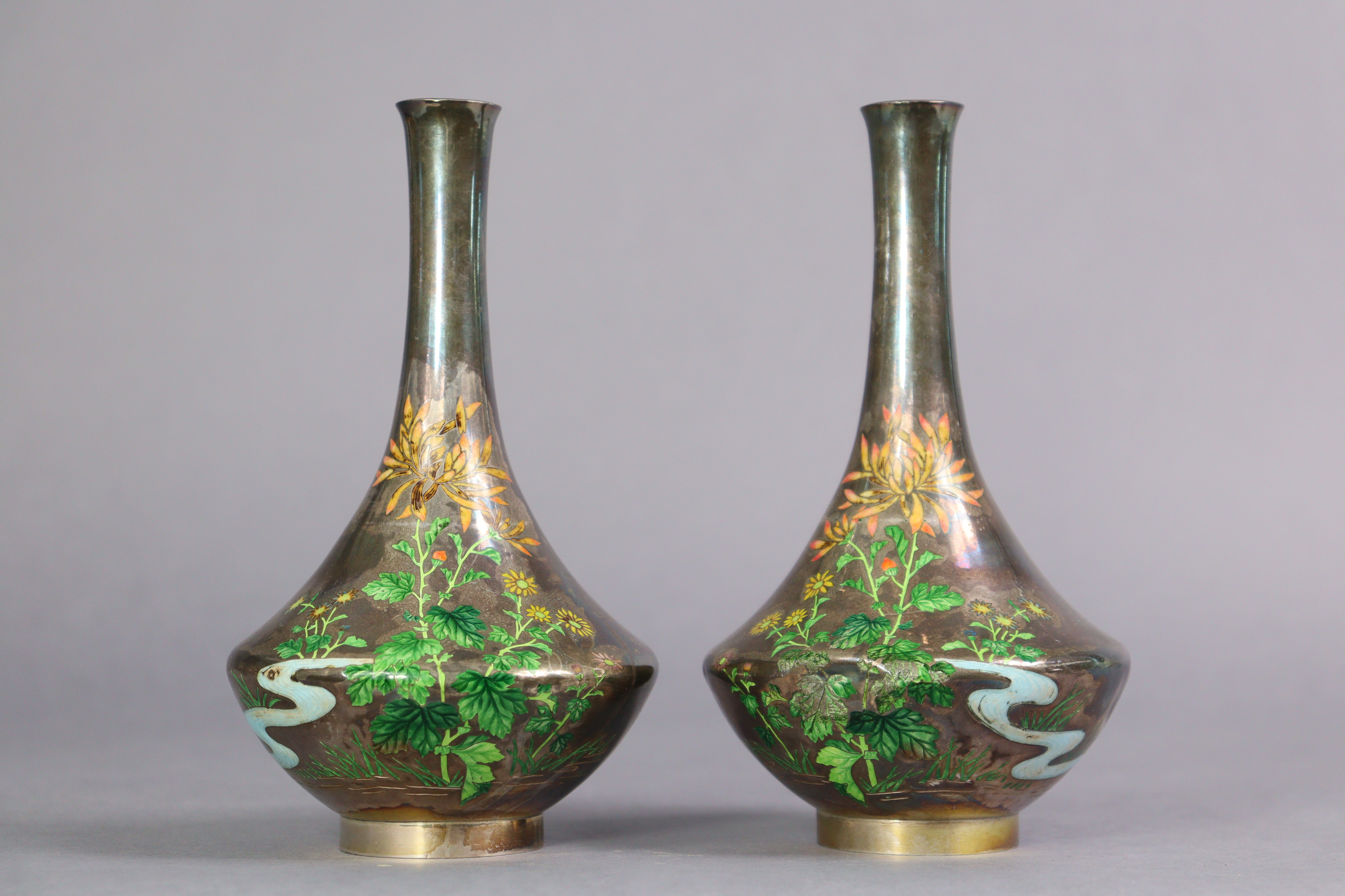 A pair of early 20th century Japanese white metal & enamelled vases, each decorated with flowers - Image 2 of 7