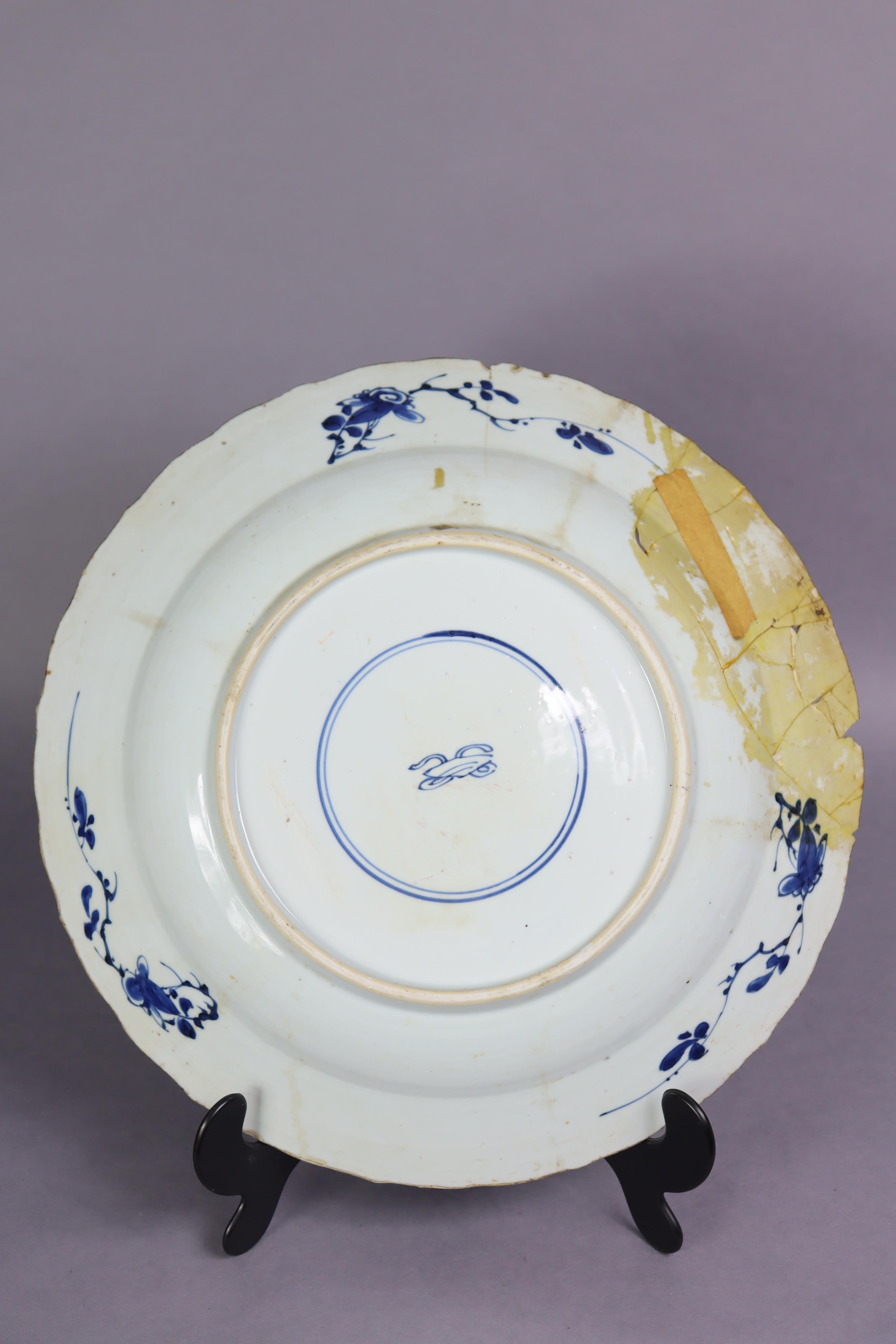 An 18th century Chinese blue & white porcelain large shallow bowl decorated with peonies on a scaled - Image 6 of 6