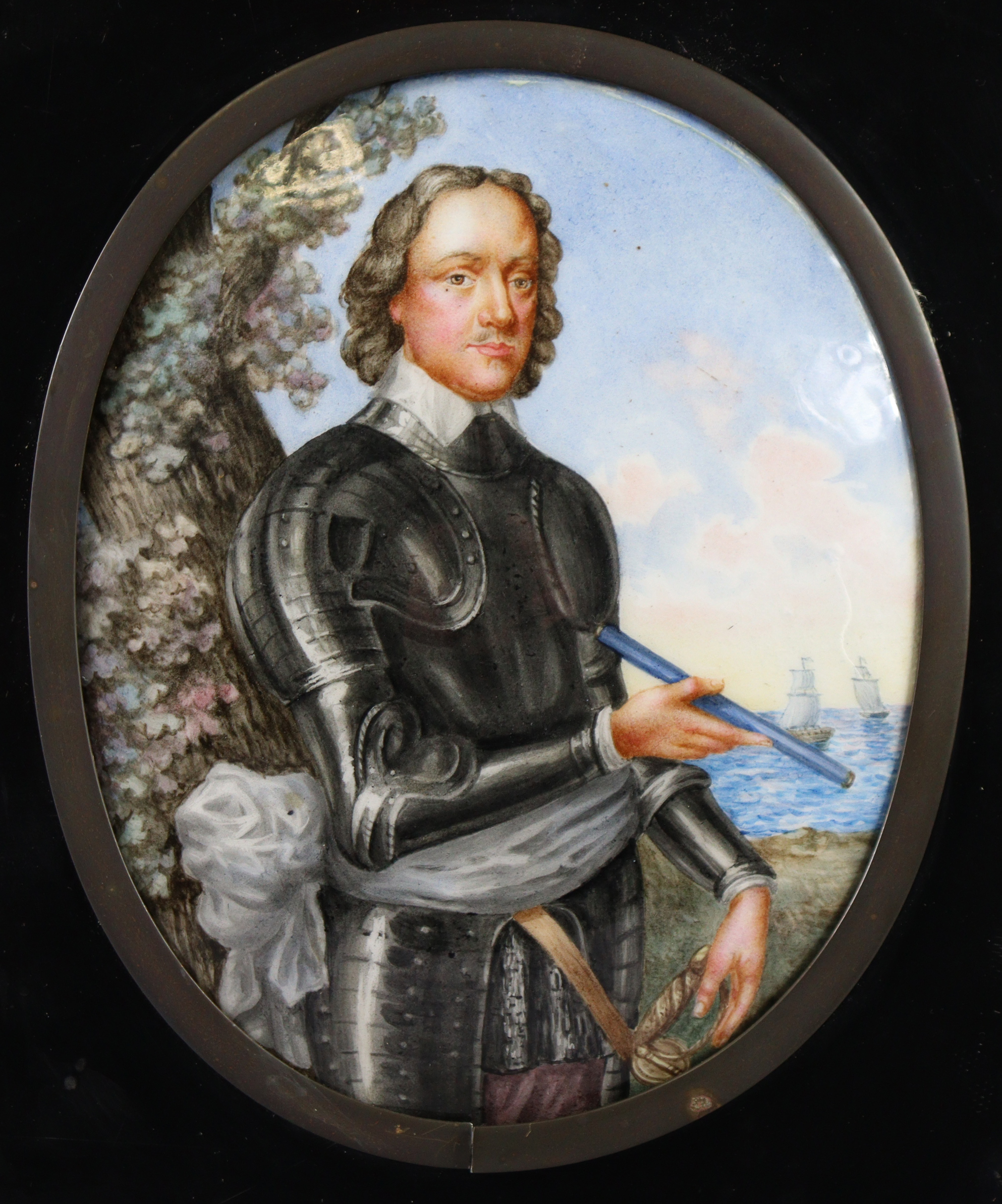 A 19th century painted enamel oval convex three-quarter length portrait of a gentleman dressed in