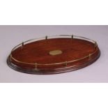 A Victorian oak oval tray with brass rail gallery & plain brass rectangular plaque to centre,