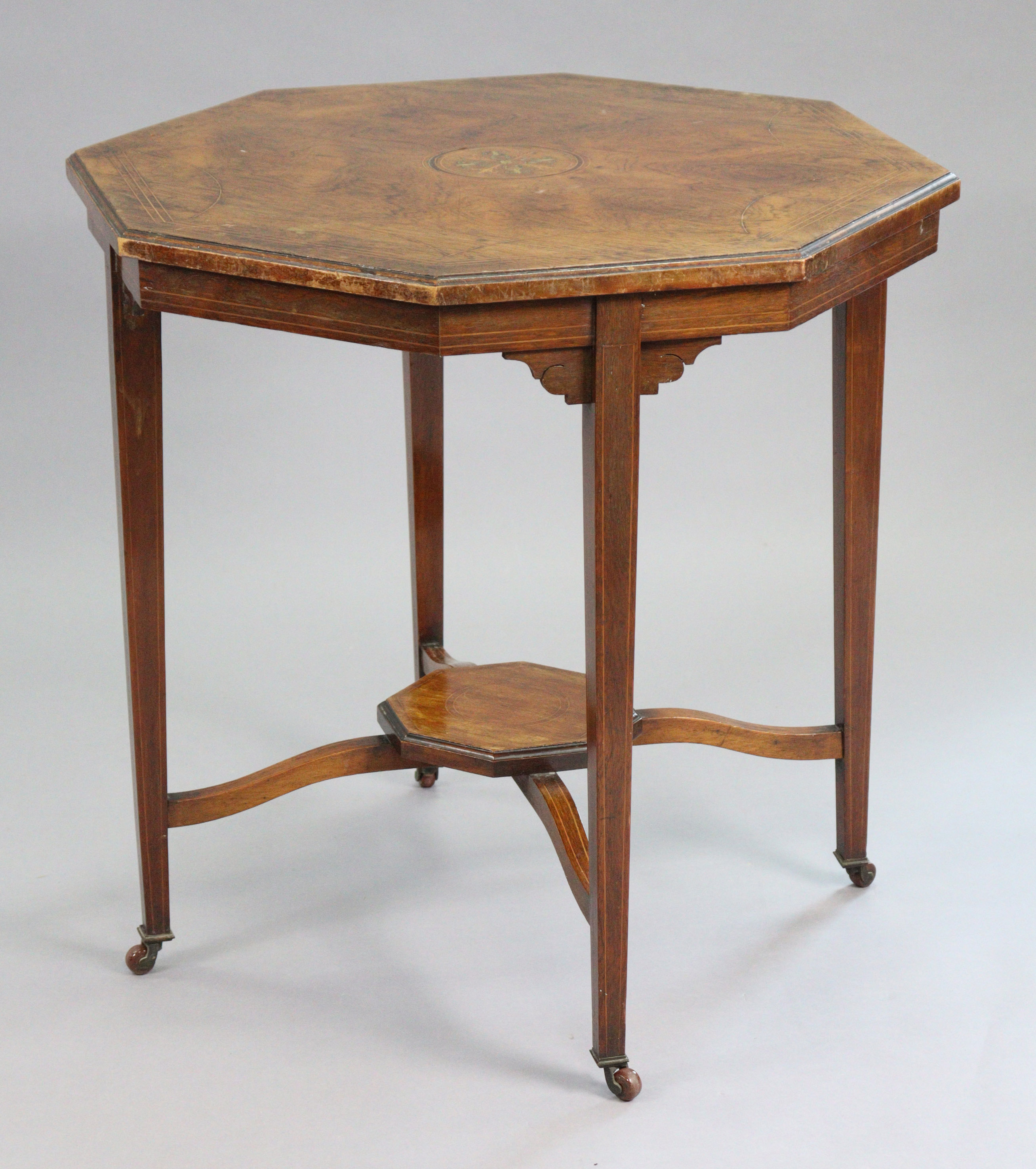 A late 19th/early 20th century rosewood octagonal centre table, the top with inlaid decoration &