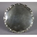 A George V silver salver with raised pie-crust border, the centre with interesting WWI Naval