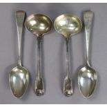 A pair of George IV silver Fiddle, Thread & Shell sauce ladles with Union Shell heels & oval