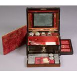 A Victorian rosewood & mother-of-pearl inlaid travelling case, fitted with numerous glass