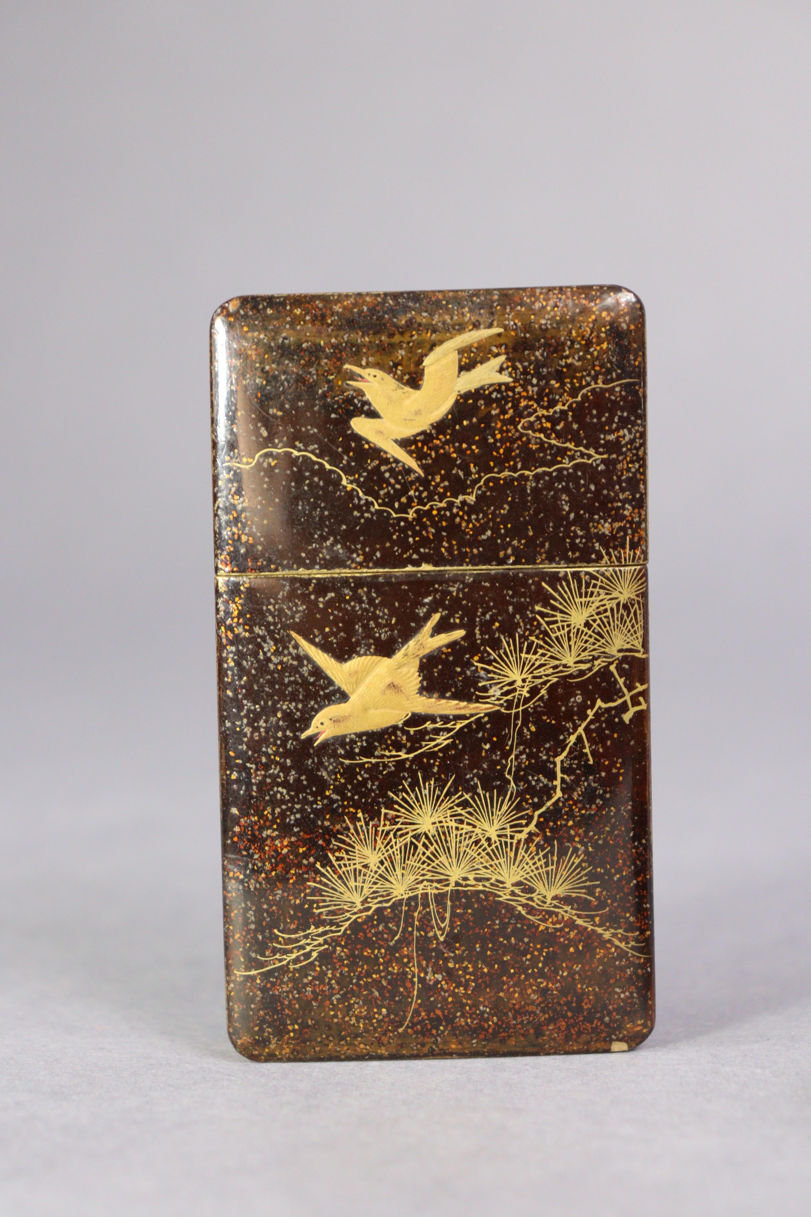 A late 19th century Japanese lacquer card case decorated with a hawk on a gilt-speckled ground, - Image 4 of 5