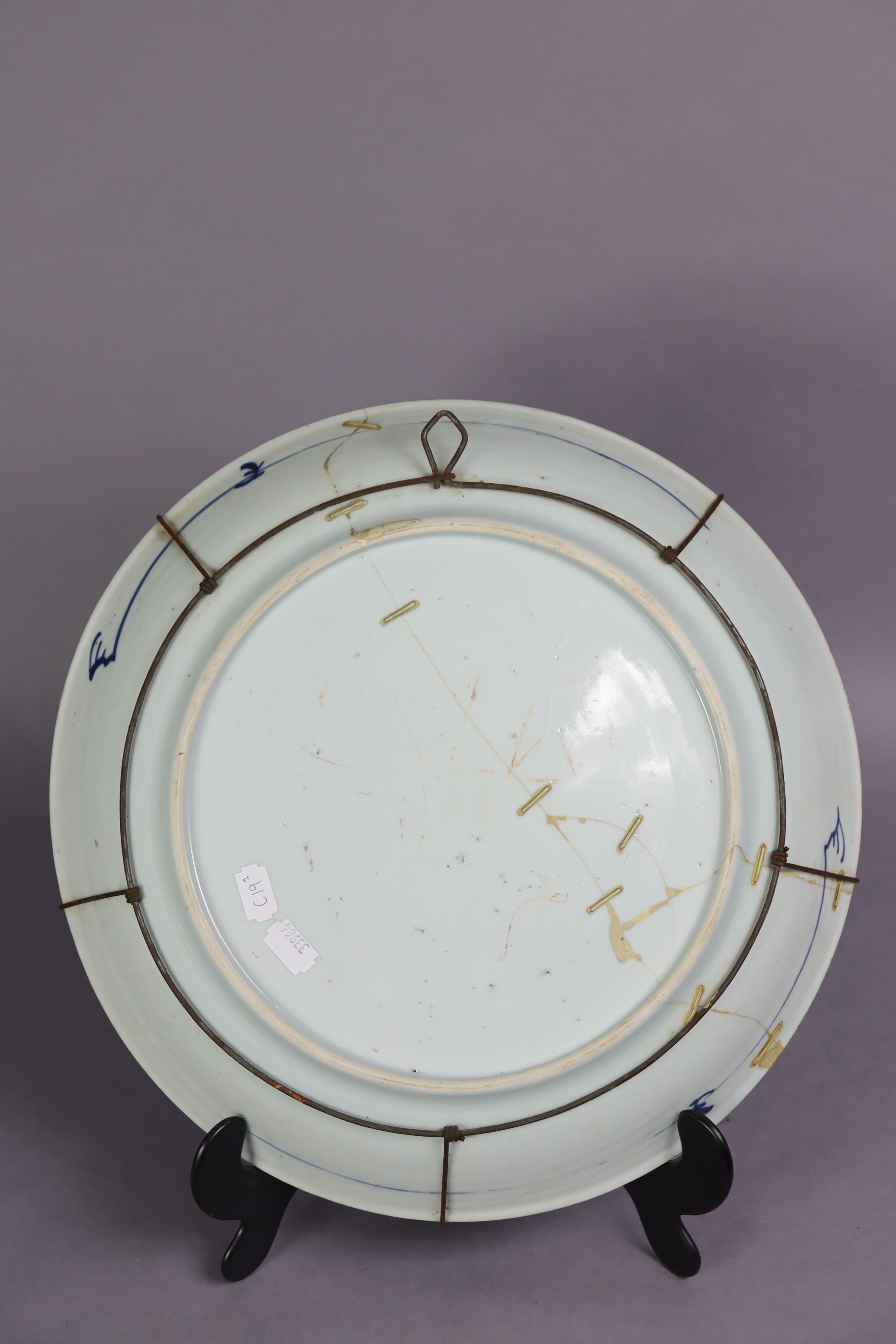 An 18th century Chinese blue & white porcelain large shallow bowl decorated with peonies on a scaled - Image 5 of 6