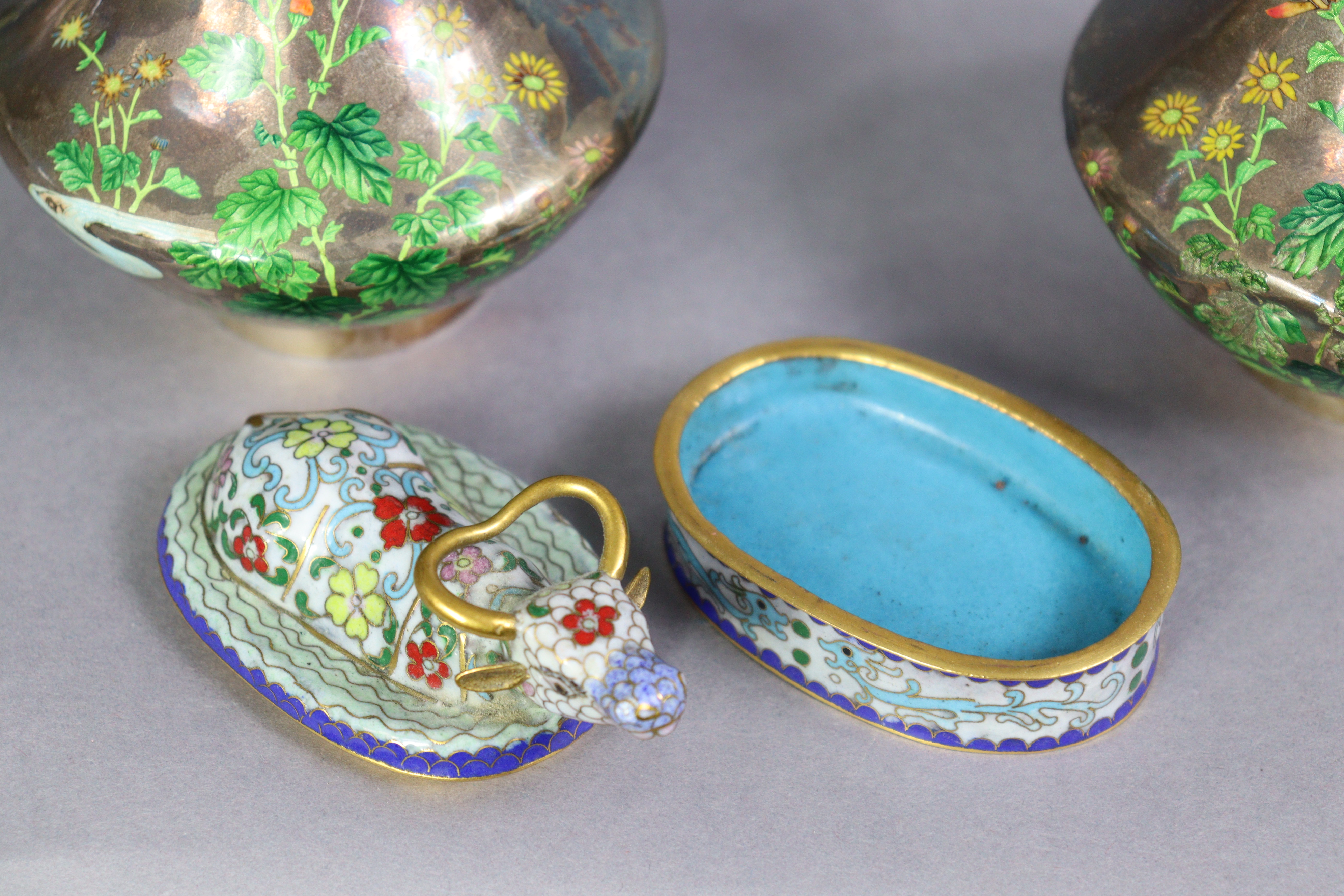 A pair of early 20th century Japanese white metal & enamelled vases, each decorated with flowers - Image 6 of 7