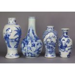 A 19th century Chinese blue & white porcelain bottle vase decorated with fishermen in a