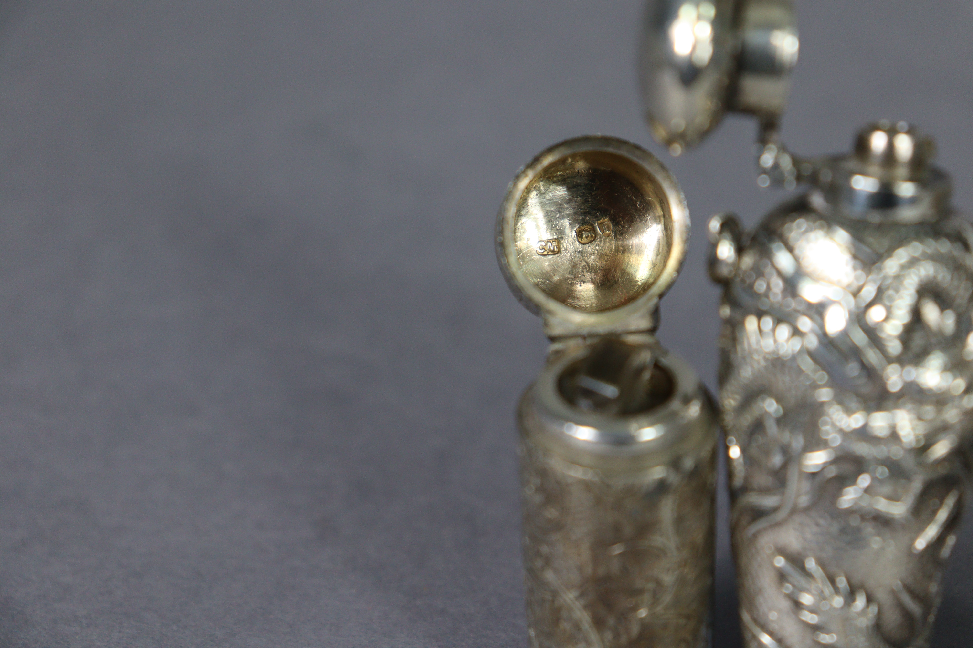 A late 19th century bloodstone cylindrical scent bottle encased in medieval style un-marked white - Image 4 of 10