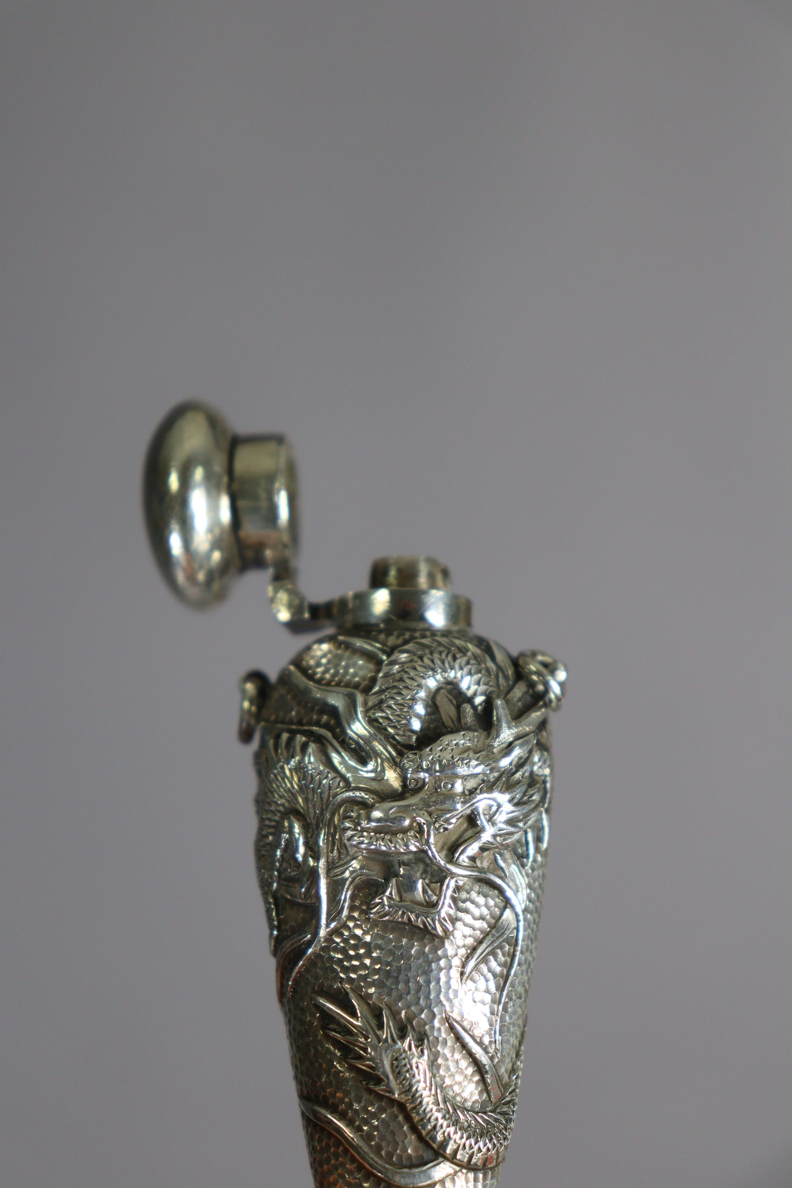 A late 19th century bloodstone cylindrical scent bottle encased in medieval style un-marked white - Image 6 of 10
