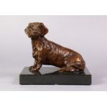 SARAH COWARD (contemporary). A cast bronze sculpture of the dachshund “Teckel”, edition 119, signed,