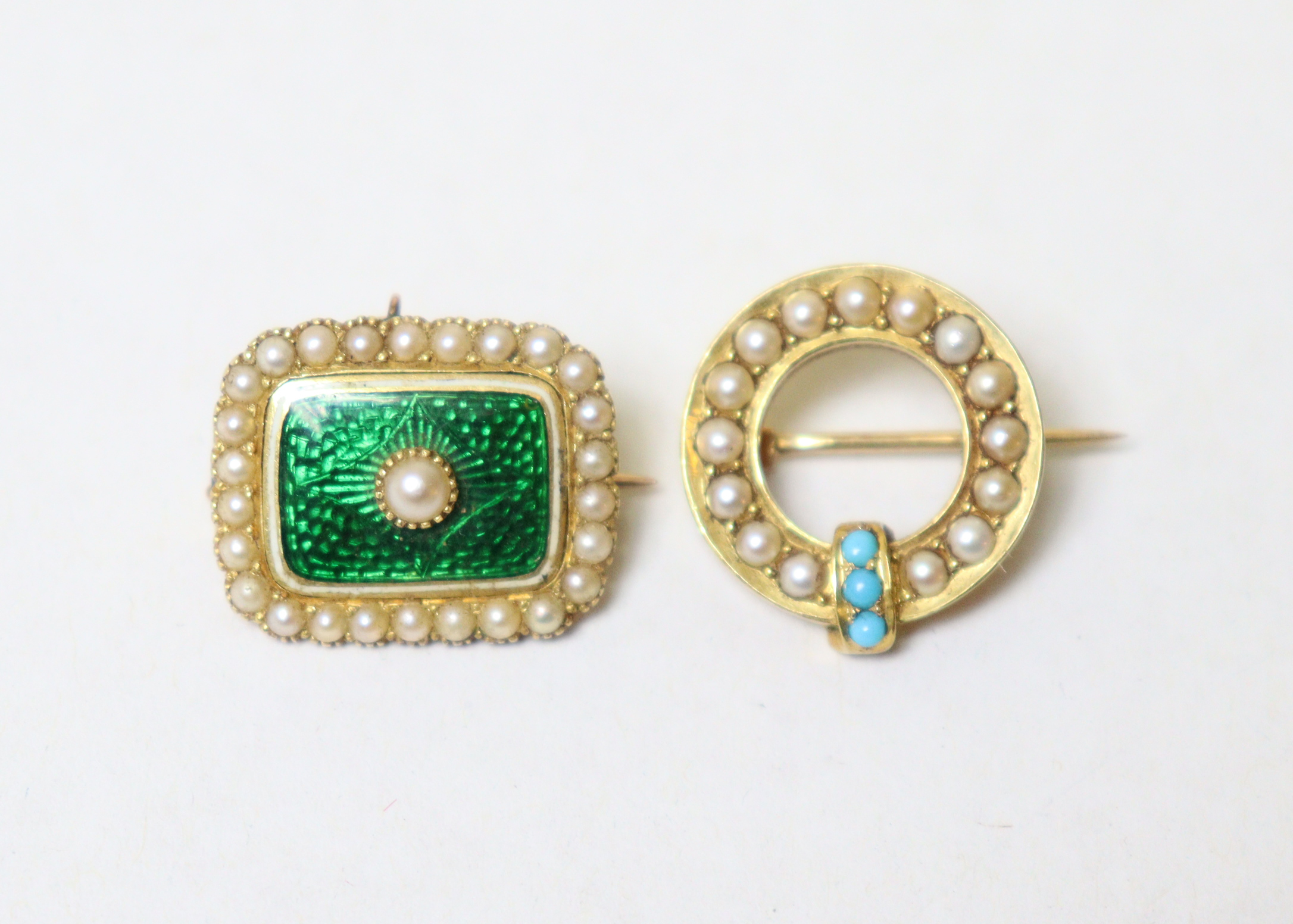 A 19th century small gold, green enamel, & seed pearl rectangular brooch with hair locket to
