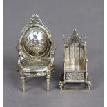 An Edwardian cast silver miniature model of the Medieval Coronation Chair, 2?” high, London 1901, by