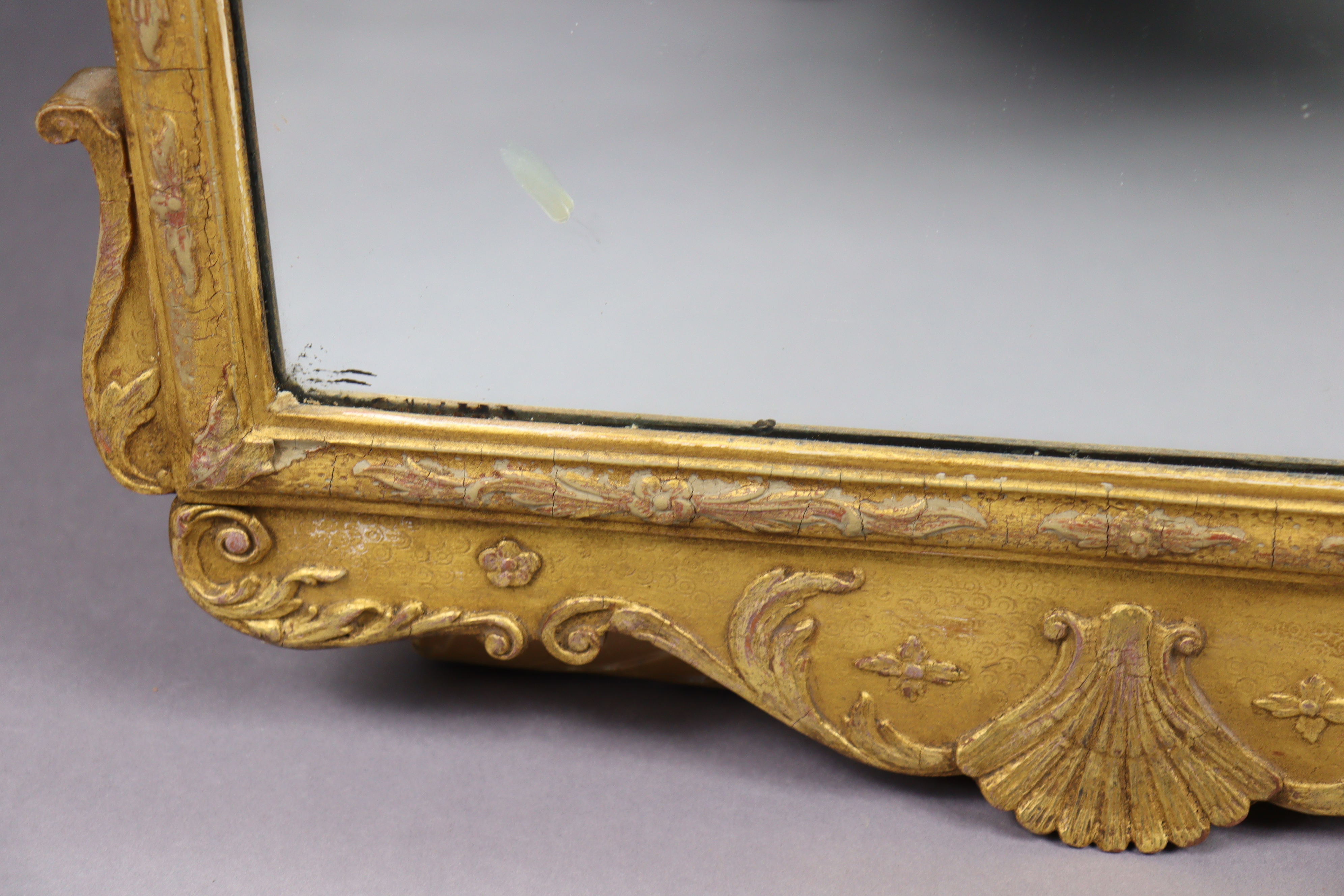A George I style carved giltwood & gesso wall mirror, of shaped rectangular form with foliate - Image 5 of 7