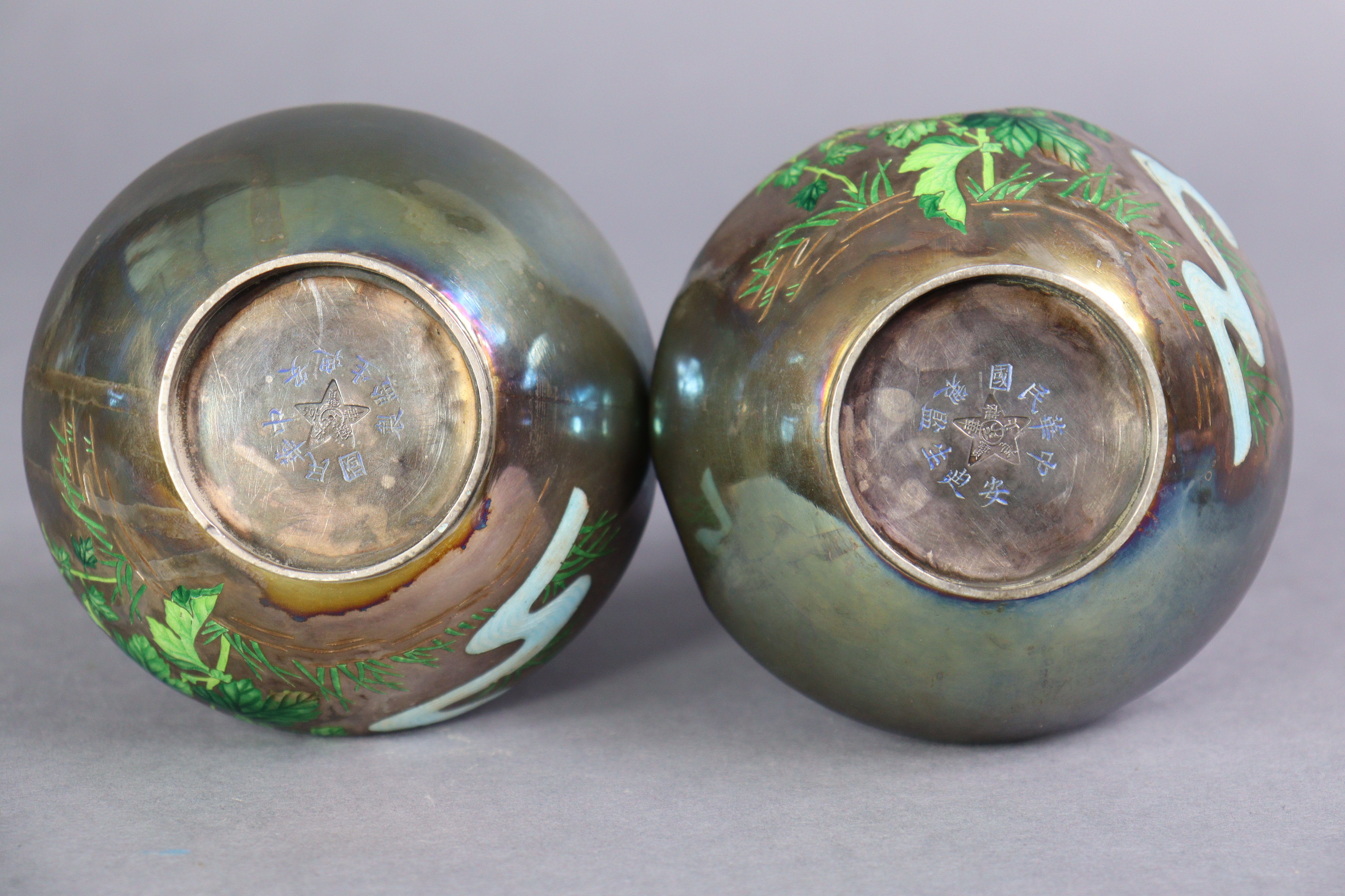 A pair of early 20th century Japanese white metal & enamelled vases, each decorated with flowers - Image 4 of 7