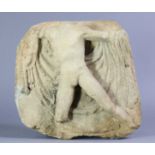 A Roman-style stone relief fragment, depicting a male torso, 9” x 10”.