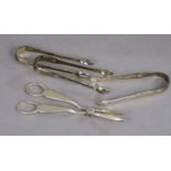 A pair of Edwardian silver grape scissors, London 1909, by Asprey & Co. (3.9oz); & three pairs of