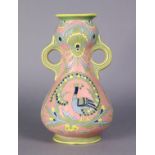 CARLA FOSSETTI (Italian, 20thC) A pink-ground baluster vase with piped peacock & floral design in