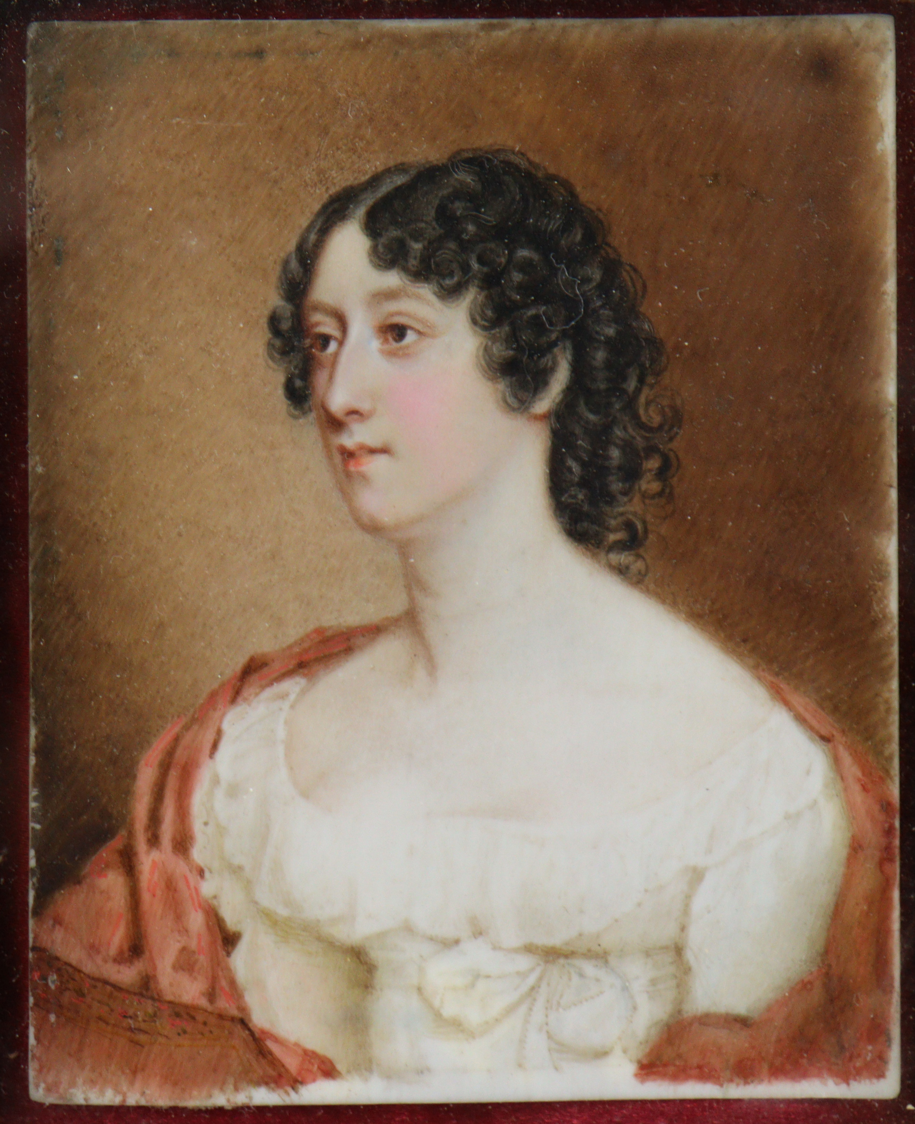 An early-mid 19th century portrait miniature of a lady, with shoulder-length curled brown hair, - Image 2 of 3