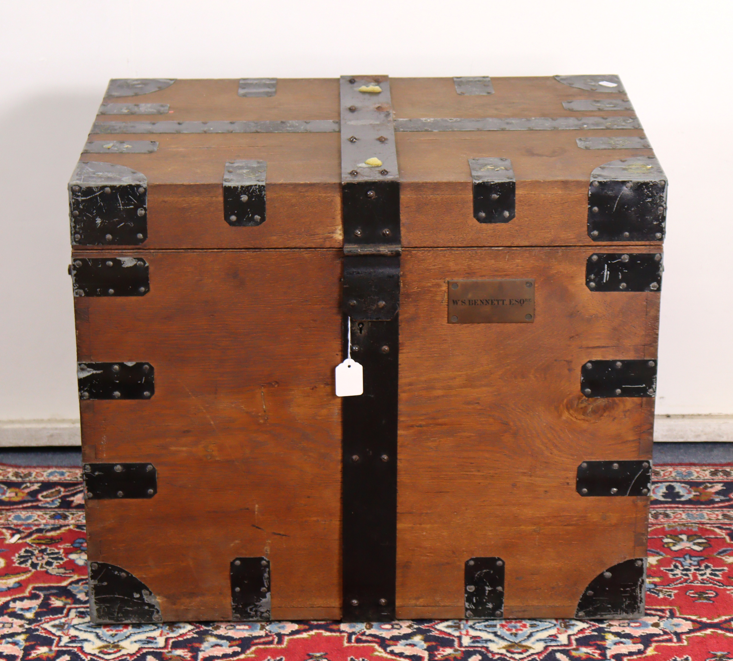 An early 19th century oak & iron-bound late chest )or silver chest), with engraved brass plaque “