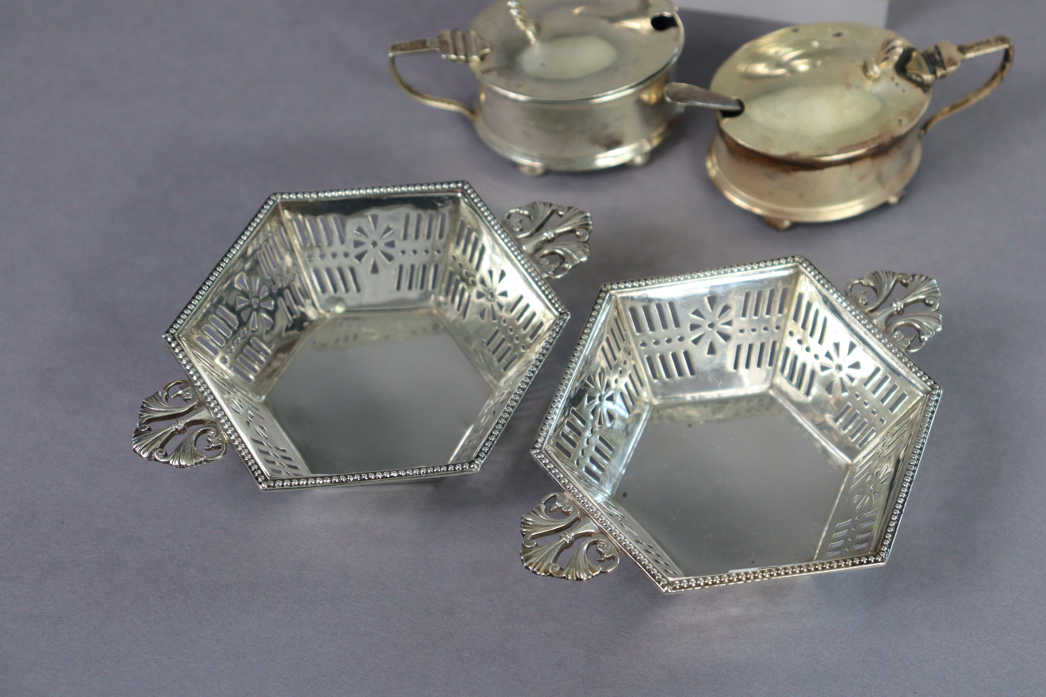 A pair of George V silver hexagonal sweetmeat dishes with pierced tapered sides & flat foliate - Image 2 of 5