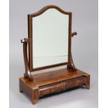 An 19th century inlaid-mahogany swing dressing mirror with shaped rectangular plate on scroll