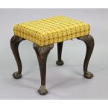 A late Victorian rectangular stool in the 18th century style, the padded seat with geometric wool