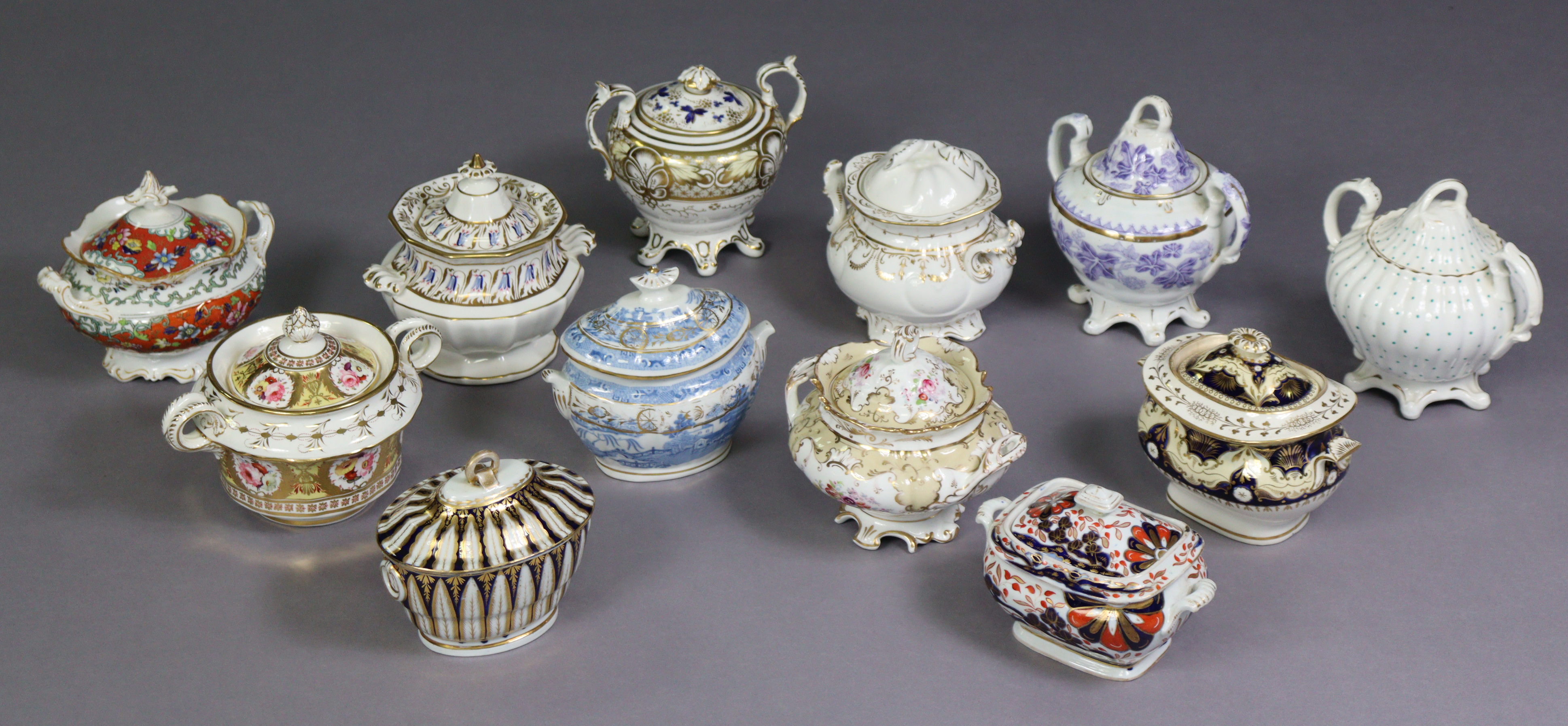 A collection of twelve various 19th century English porcelain sucrieres, 4½” to 7” high.