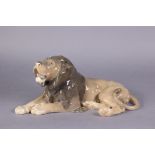 A Royal Copenhagen porcelain model of a recumbent lion, No. 1268 by Lauritz Jensen, 14” long x 6”