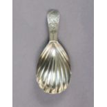 A George III silver caddy spoon with shell bowl & bright-cut handle, London 1791, by Thos.