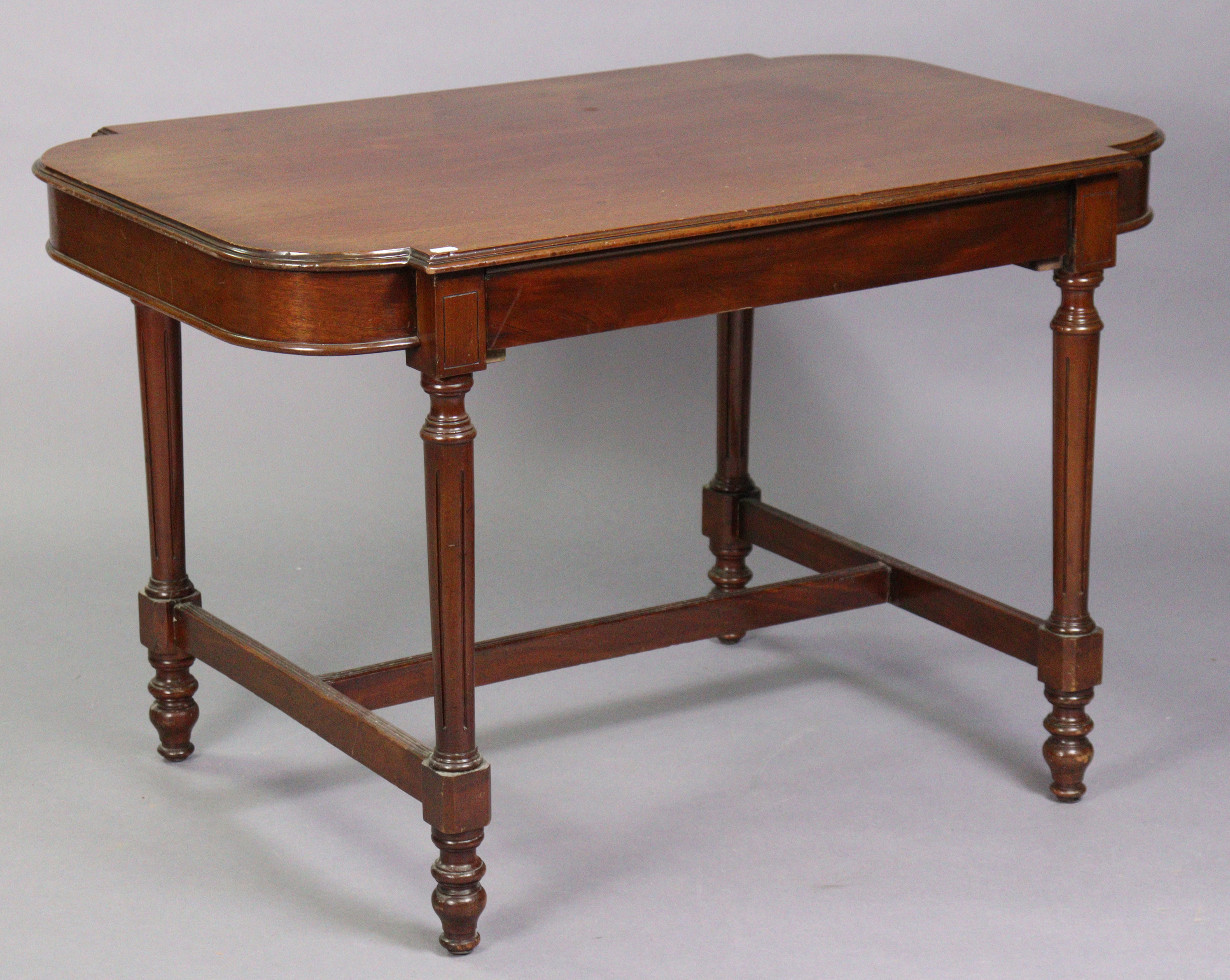 A late 19th century French mahogany centre table, the shaped rectangular top with rounded ends,