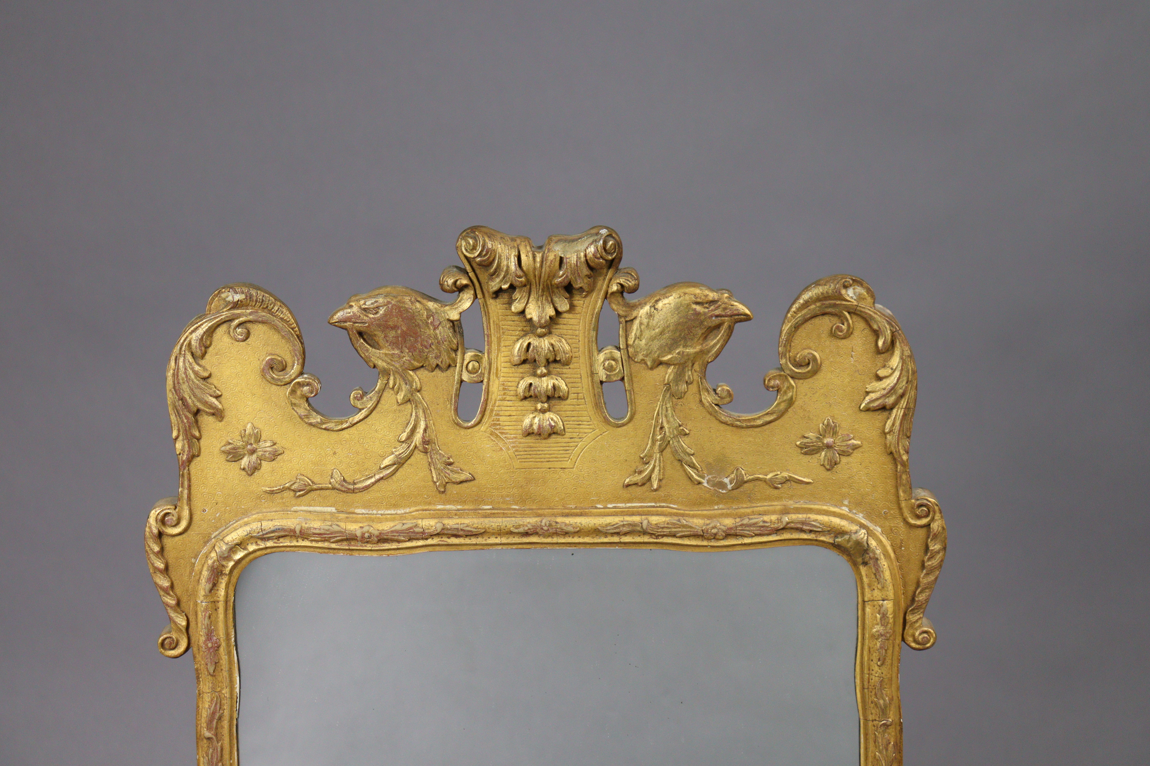 A George I style carved giltwood & gesso wall mirror, of shaped rectangular form with foliate - Image 2 of 7