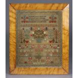 A mid-19th century needlework sampler, worked by “Susanah Joyce, Aged 12 Years, 1852”, with verse