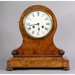 A Victorian burr-walnut mantel clock in balloon-shaped case with applied foliate roundels, on plinth