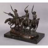 A large bronze figure group after Remington, of cowboys riding horse-back, pistols held aloft, on