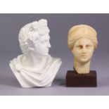 A decorative alabaster bust of a Roman female after the antique, on wooden base, 9½” high; & a ditto