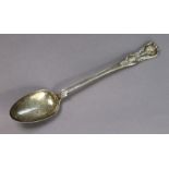 A George IV silver Queen’s pattern basting spoon with honeysuckle heel, 12¼” long; London 1822, by