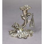 An early Victorian silver taper stick of foliate design, with detachable drip-pan & snuffer cone,