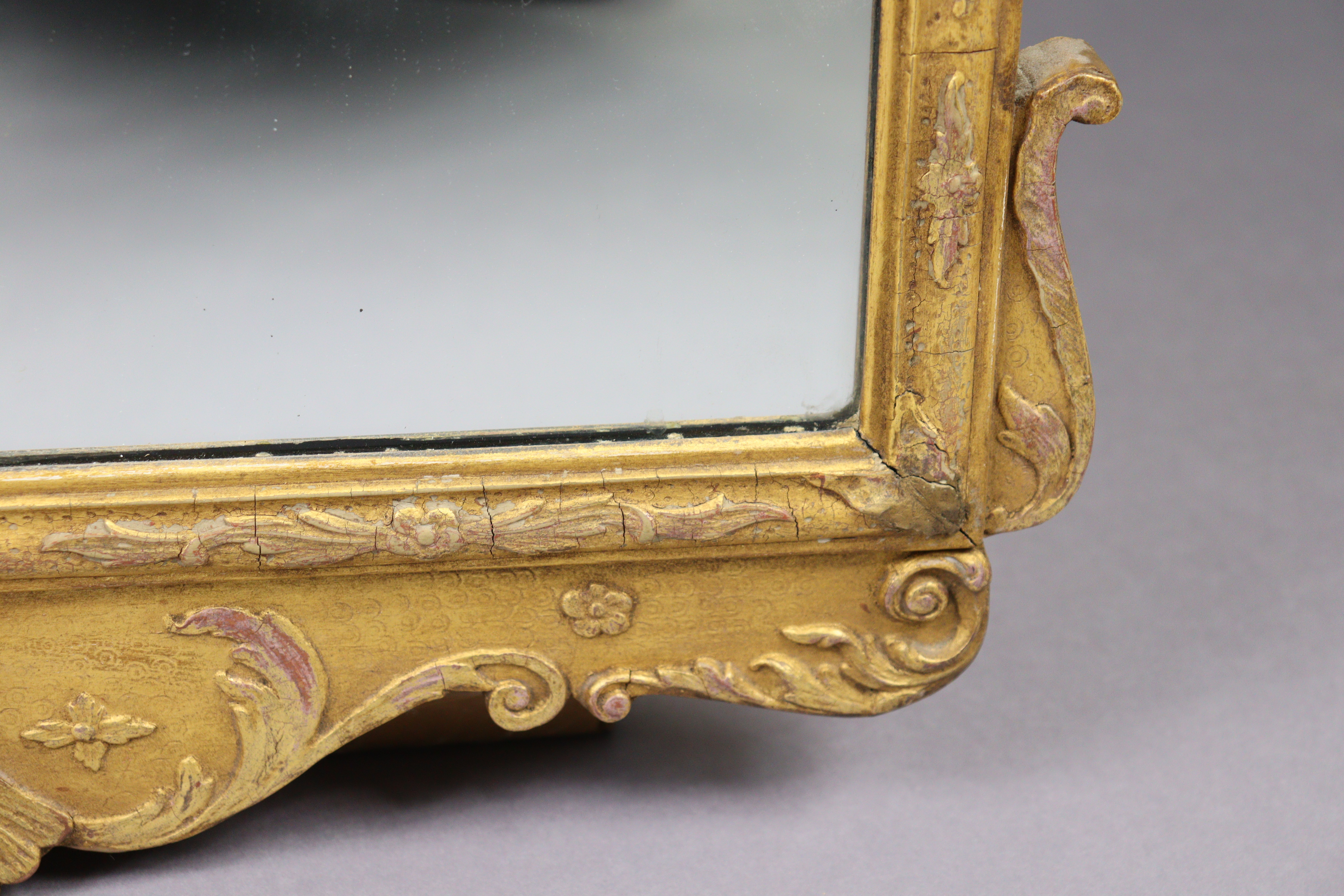 A George I style carved giltwood & gesso wall mirror, of shaped rectangular form with foliate - Image 4 of 7