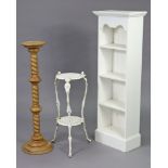 A white painted pine small four-tier standing open bookcase on a plinth base, 17” wide x 50¼”