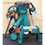 A Bosch “1600 HP” garden shredder; together with two hedge-cutters.
