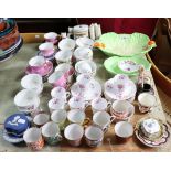 Six Spode china “Dorothy Perkins” coffee cups; eleven ditto saucers; a Carlton ware moulded green-