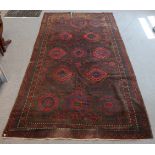 An antique Bokhara large rug (w.a.f., 11'7" x 6'2"), & two small modern rugs, 4'9" x 3'2" & 4'2" x 2